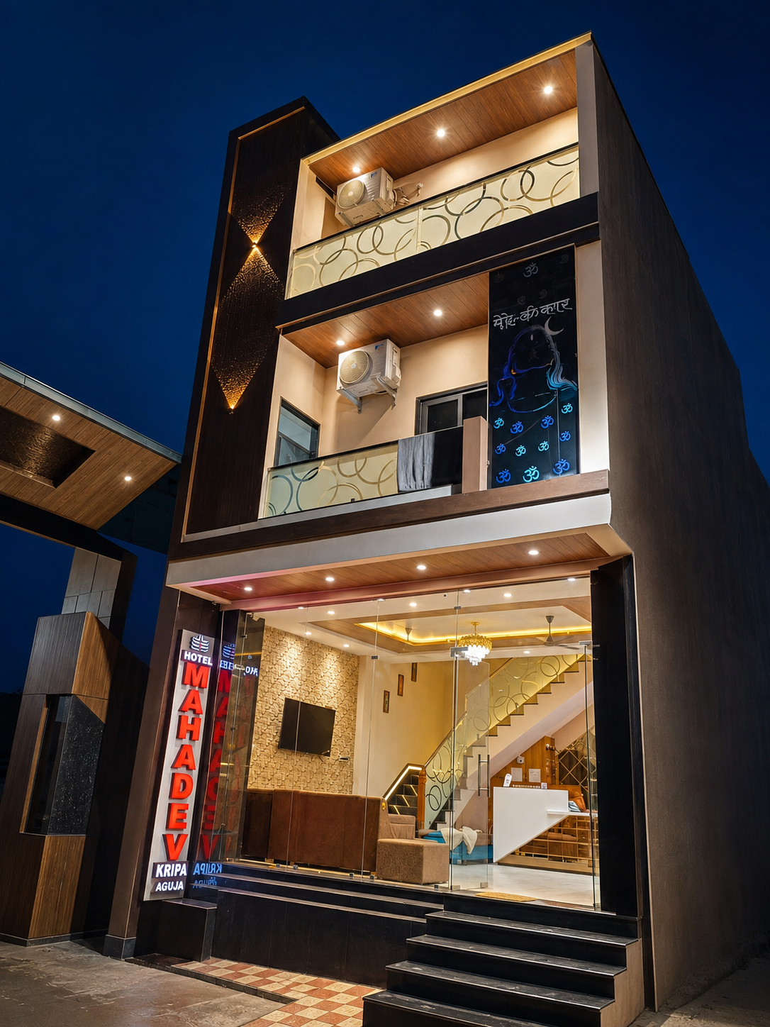 Hotel Mahadev Kripa building exterior illuminated at night